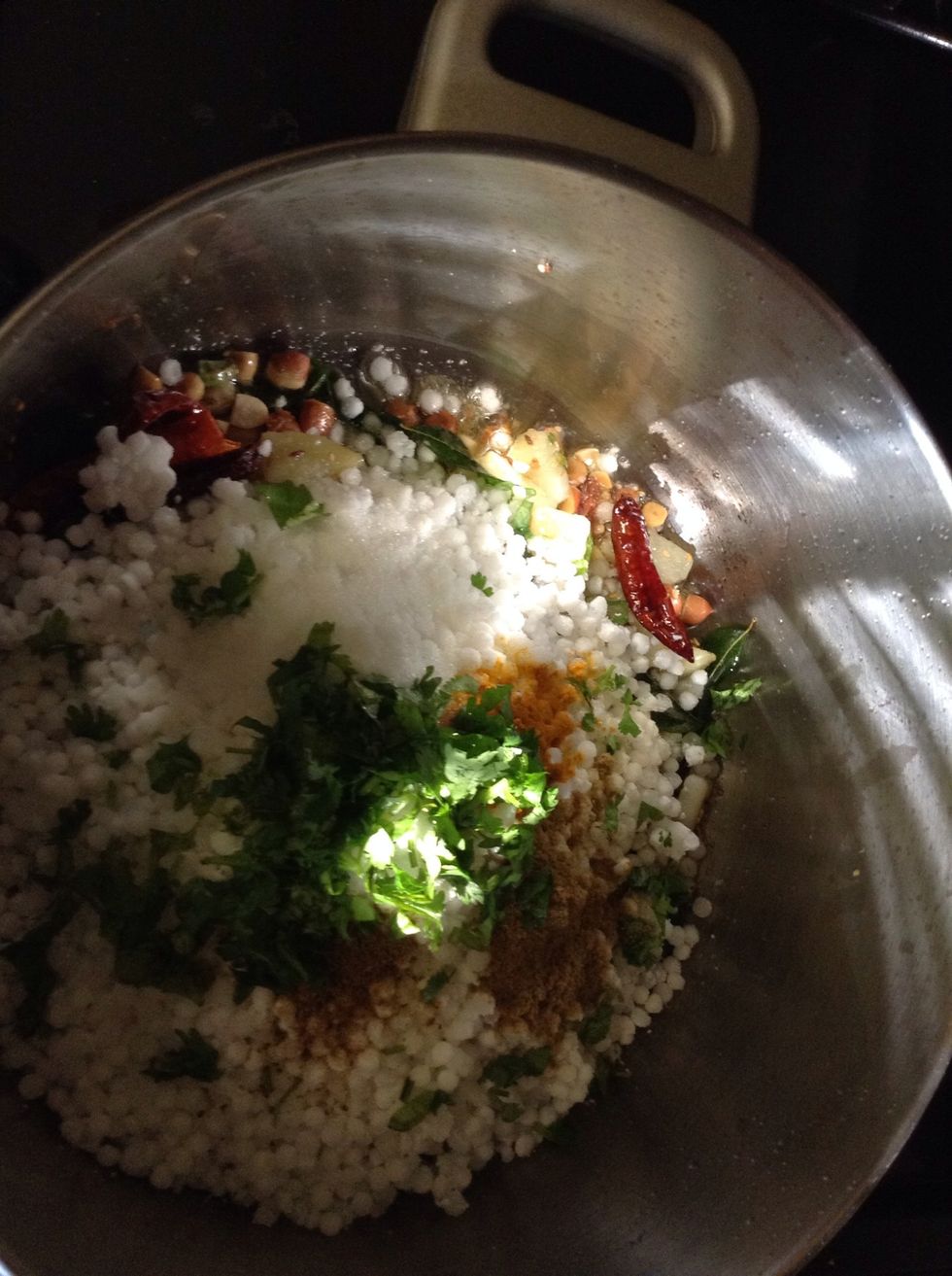 Add turmeric, salt, sugar, dry coriander powder(optional). You can add red chilli powder too if you want it more spicy.