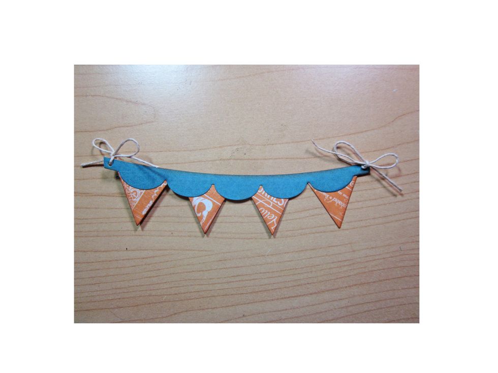 Add twine bows to your banners and attach to the front of the box.