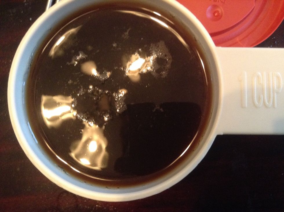 Add two and a half cups of coffee to the new bowl. Note that we put another cup and a half into the bowl. The picture shows only one cup.