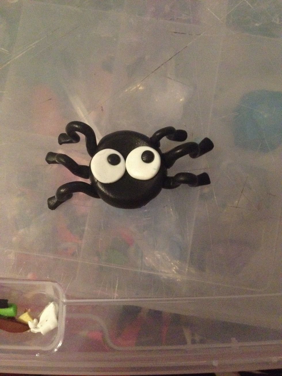 Add two black balls in the eyes