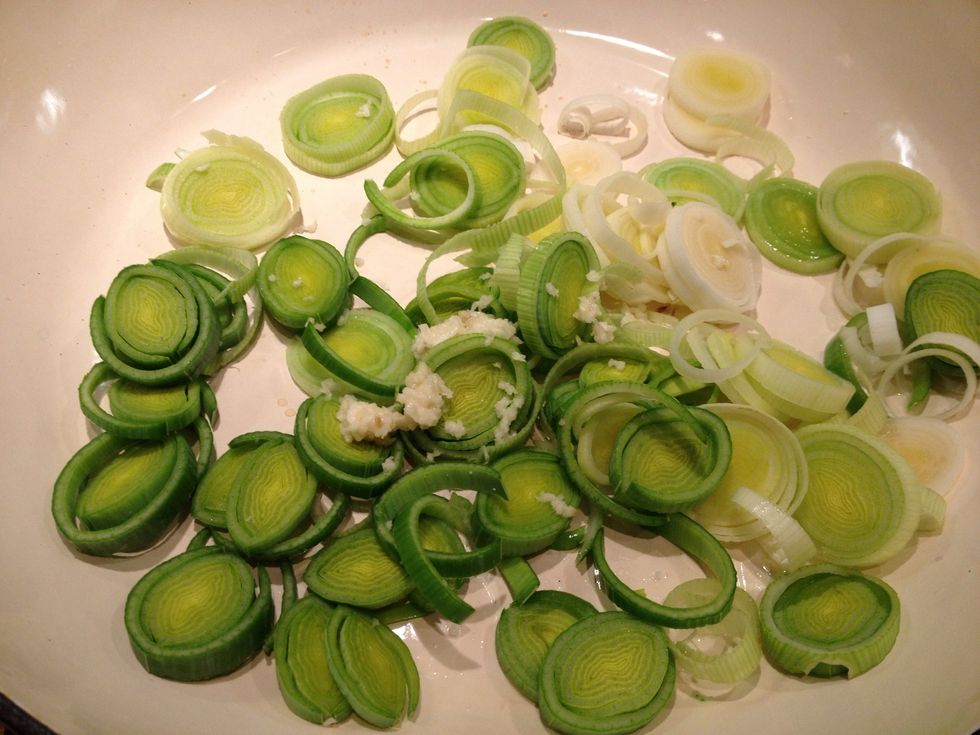 Add two crushed garlic cloves