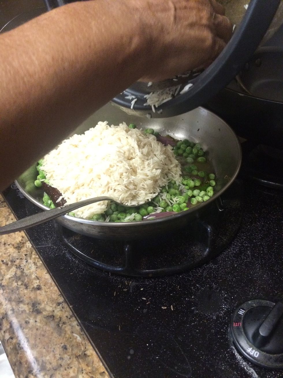 Add two cups prewashed rice