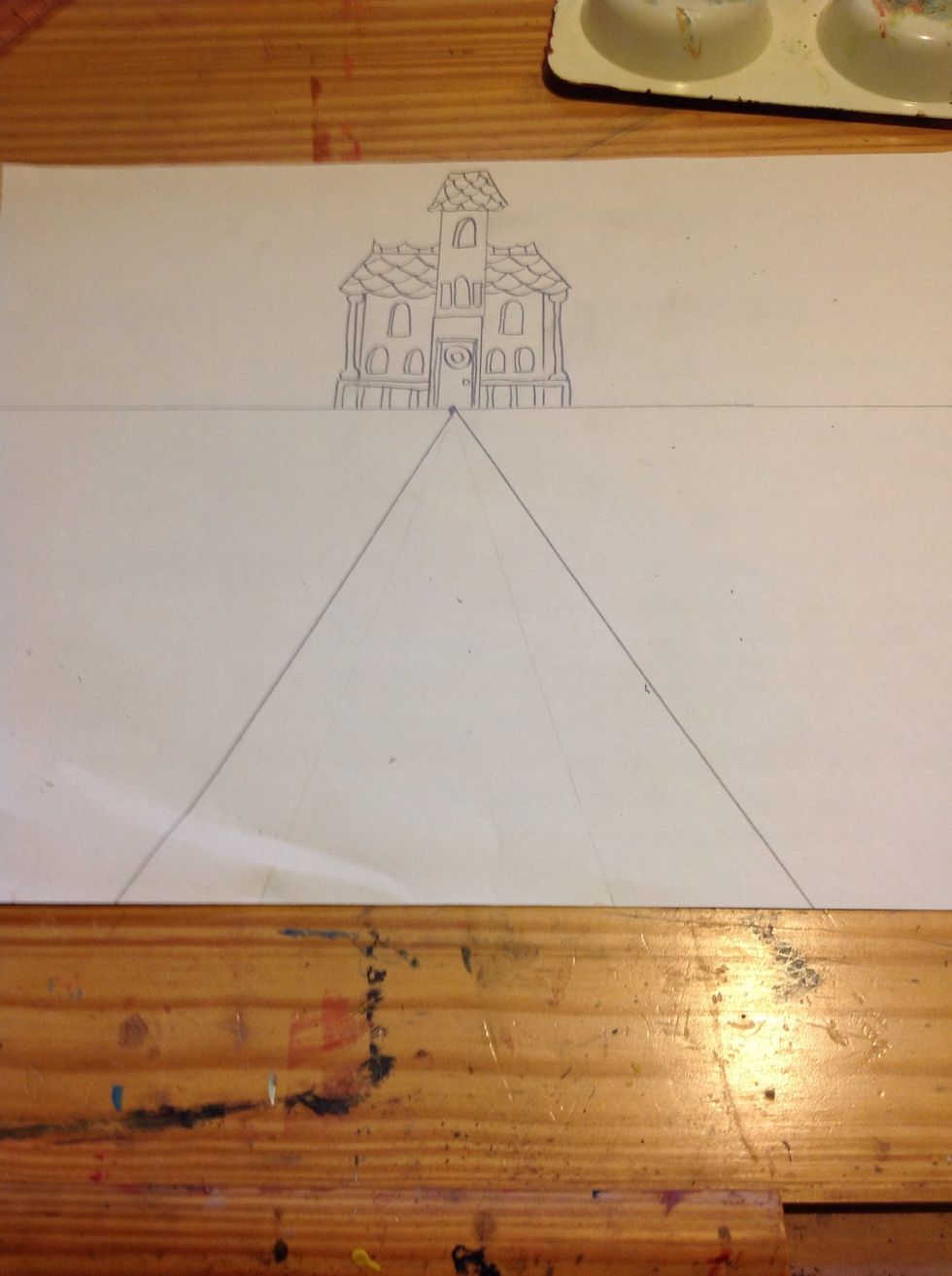 Add two diagonal lines the start at the vanishing point and end at the bottom of the paper