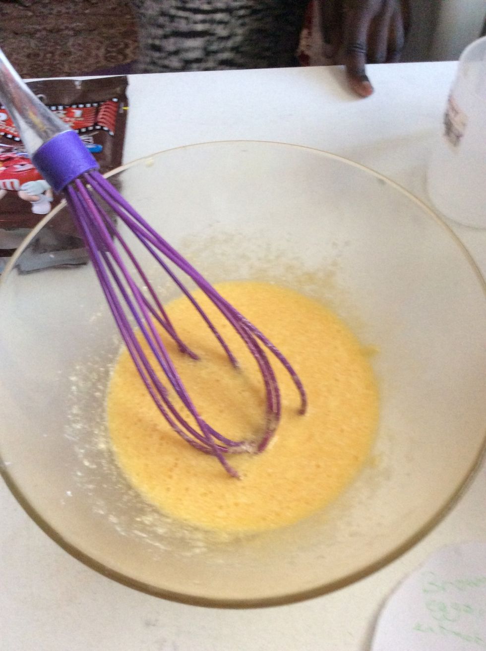 Add two eggs and mix