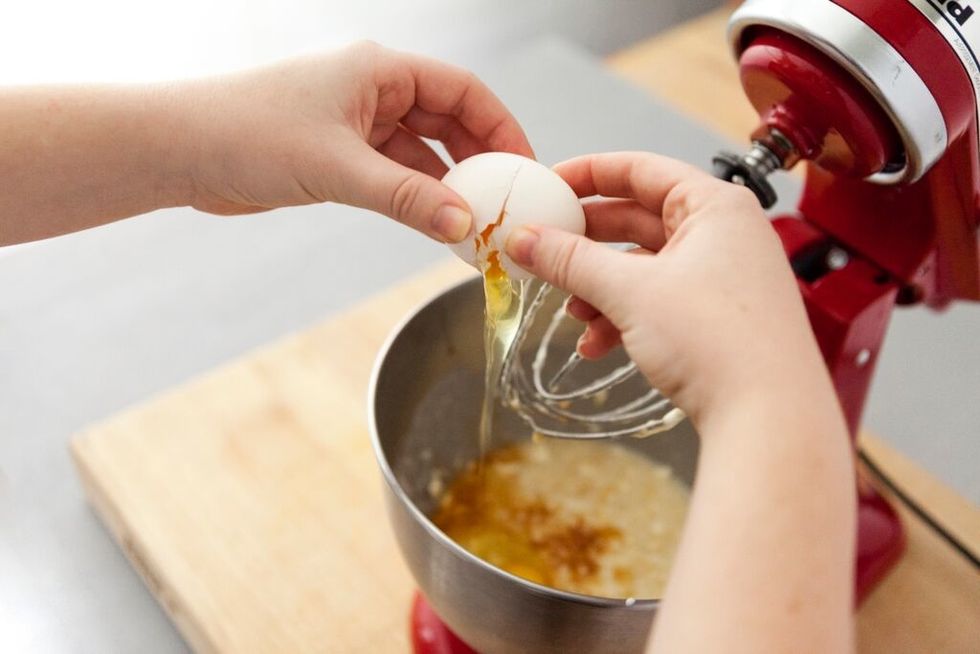 Add two eggs and stir until combined.