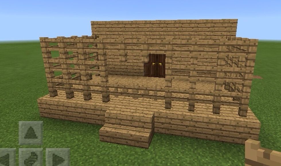 Add two fence gates in front of the stairs.