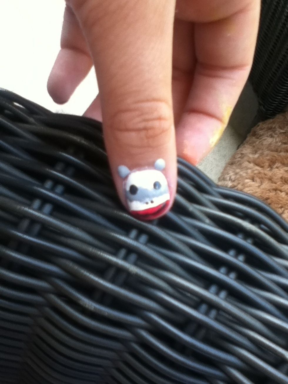 Add two grey 'ears' on your skin if desired.