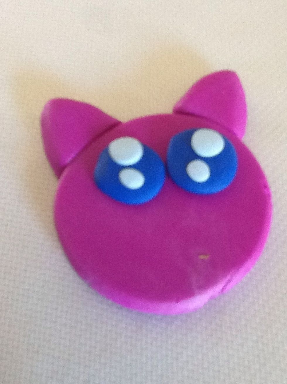 Add two little circles into the big one