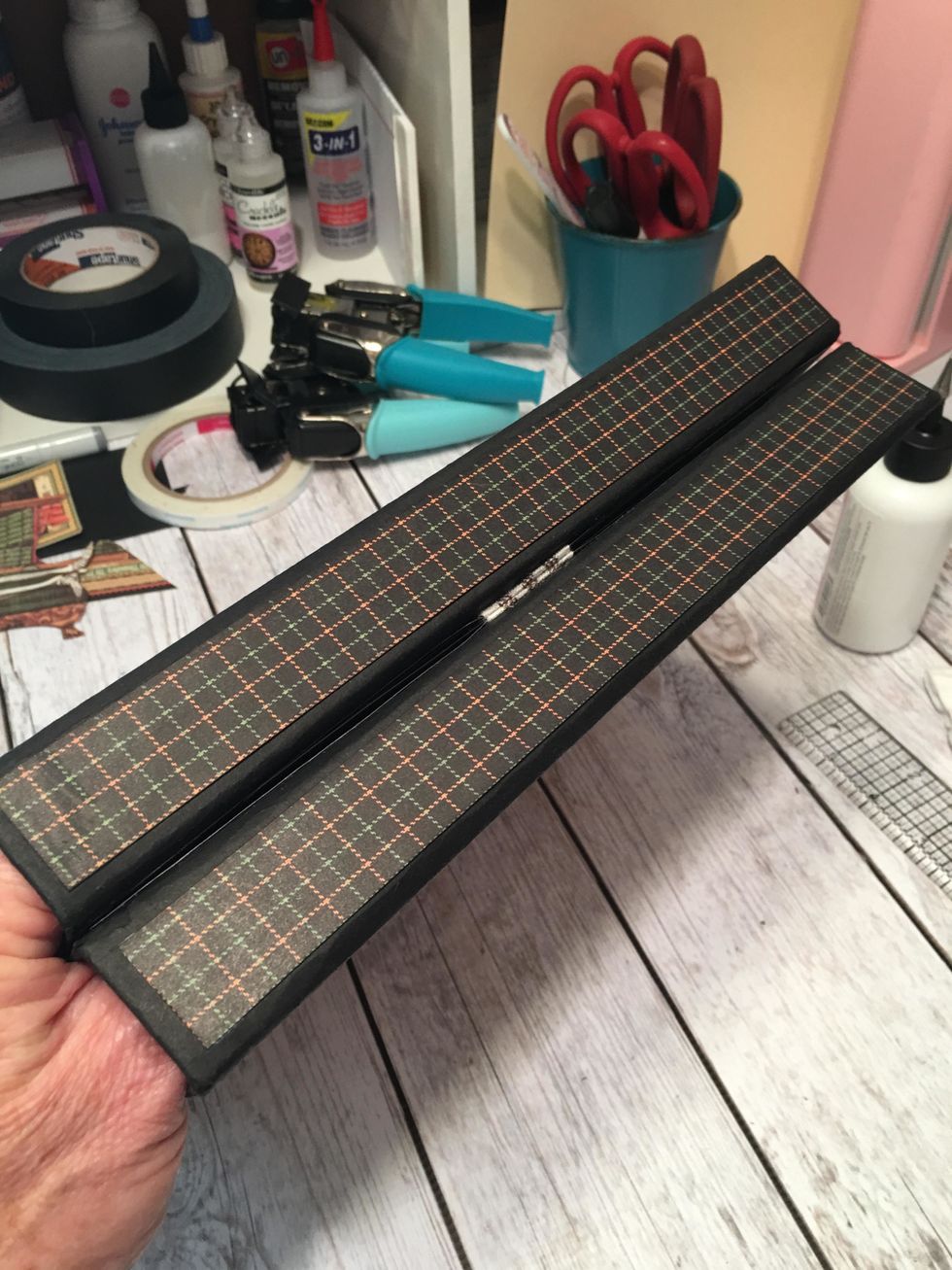 Add two matching patterned papers to the smaller spine areas on the opposite side.