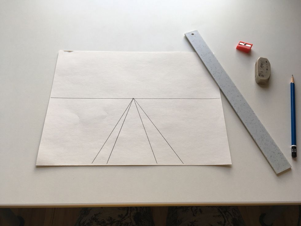 Add two more diagonal lines if you want a sidewalk.