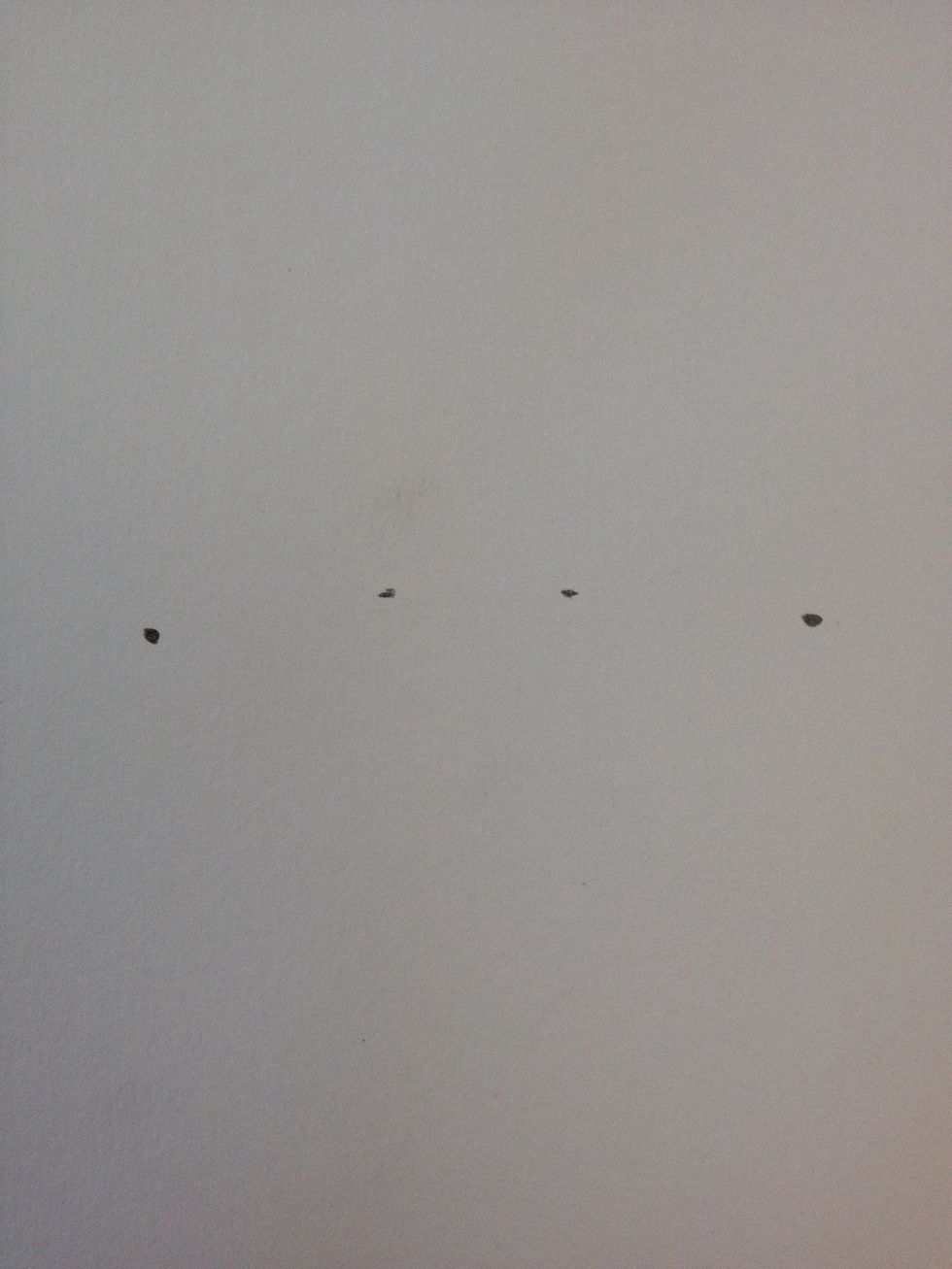 Add two more dots, slightly higher than the first two.