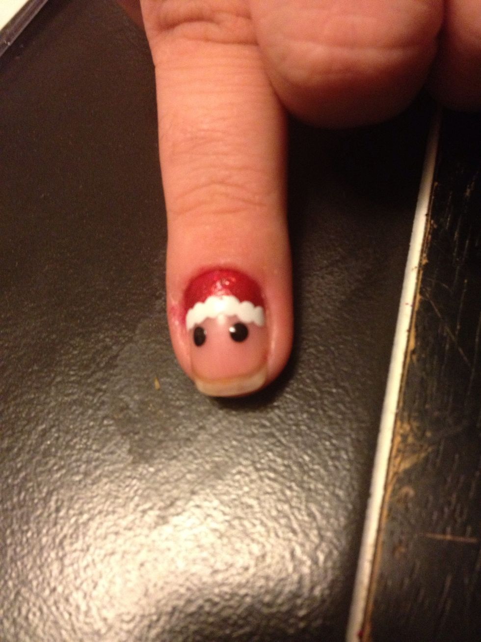 Add two small black dots as his eyes