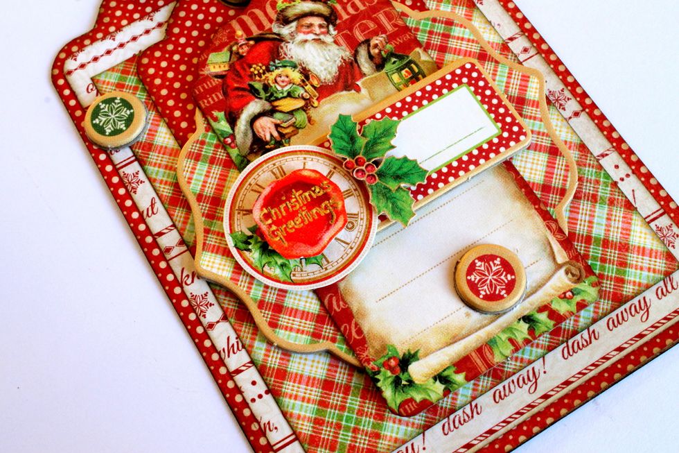 Add two small chipboard snowflakes to the card.