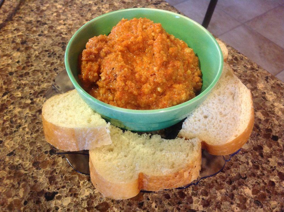 Add two tablespoons of olive oil. Add more if you prefer. Refrigerate for at least an hour, and then bring back to room temperature and serve with bread of your choice. I like soft French bread.