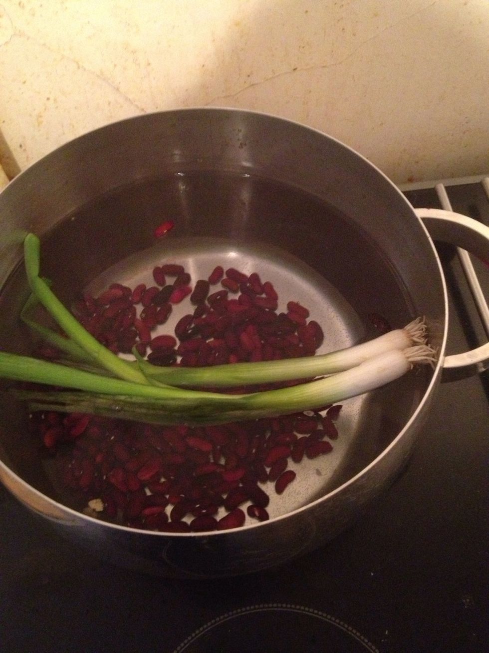 Add two whole spring onions