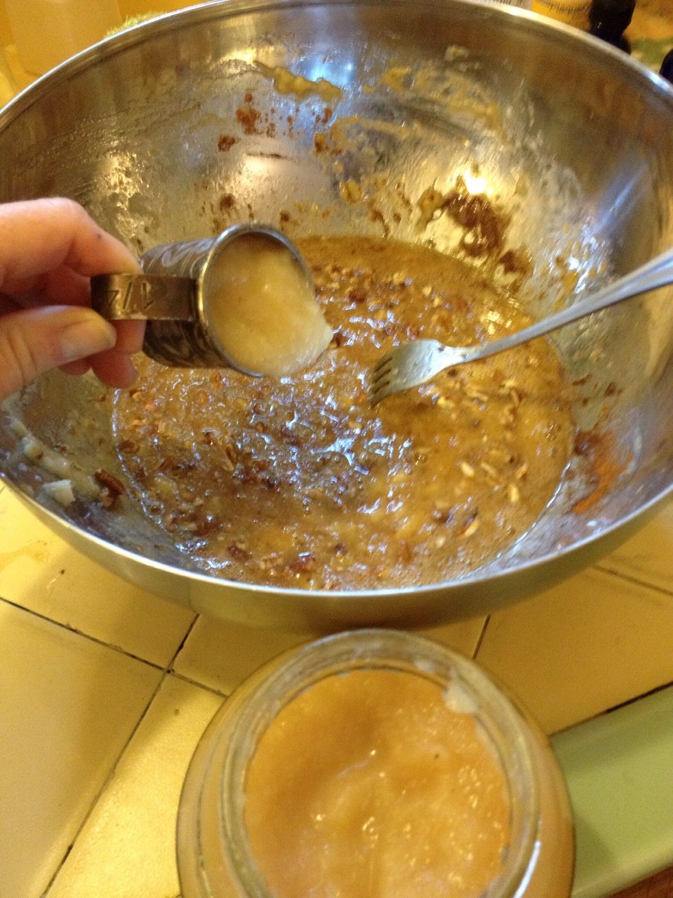 Add unsweetened apple sauce. Stir it up into the mixture.