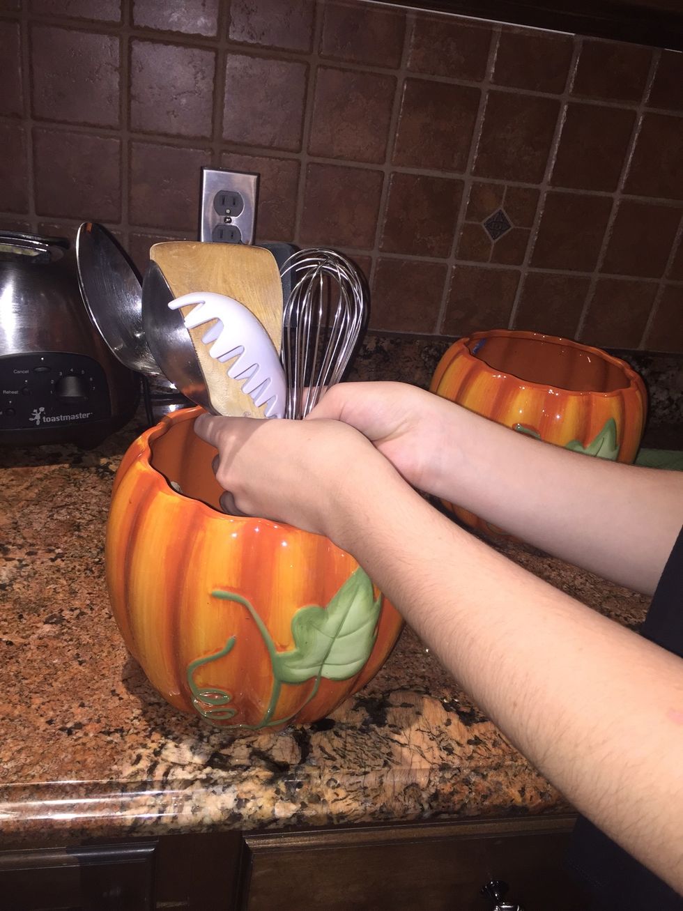 Add utensils to pumpkin bowl