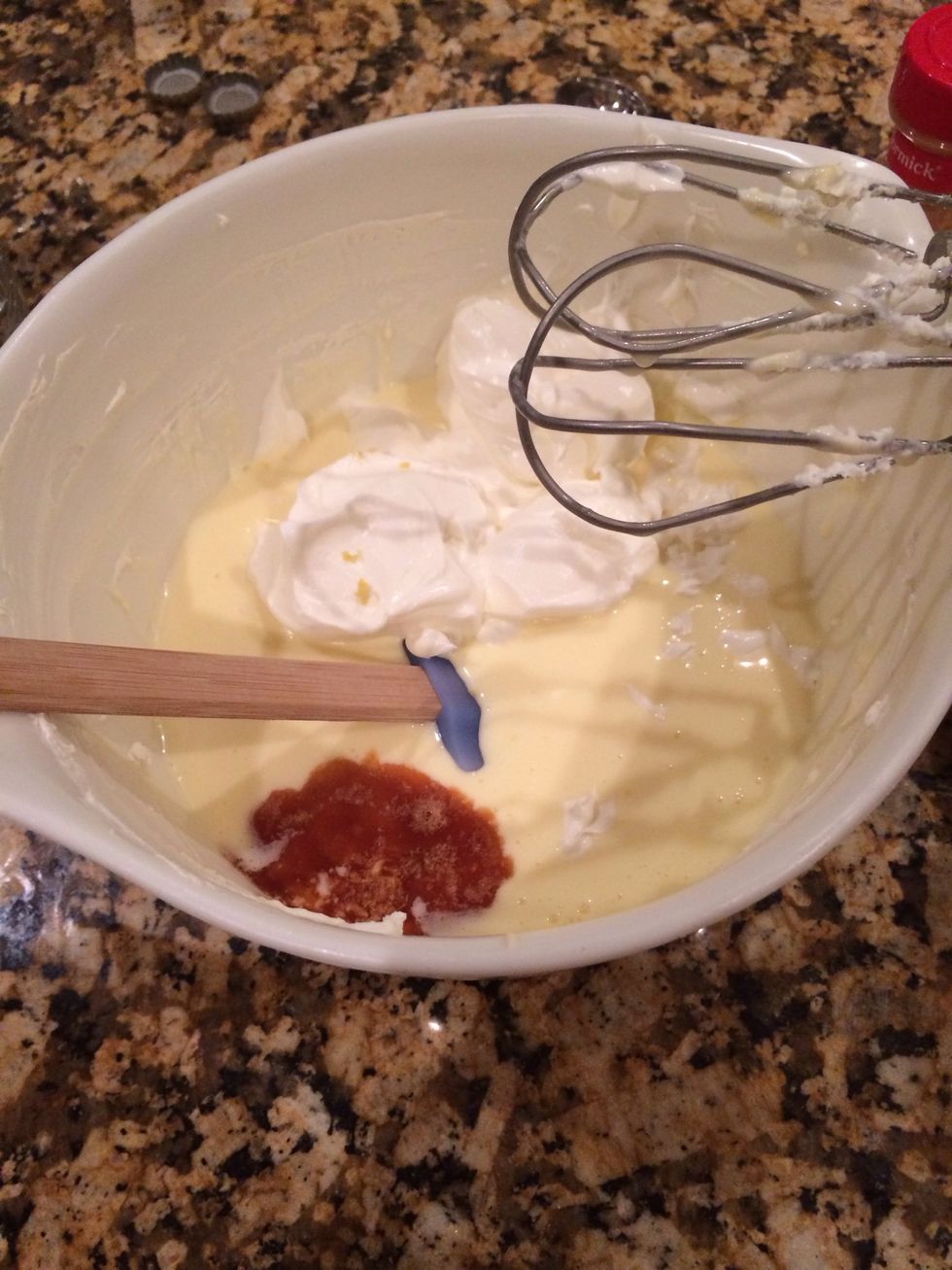 Add vanilla extract and sour cream