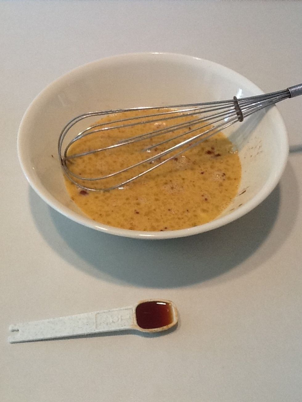Add vanilla extract, then whisk.
