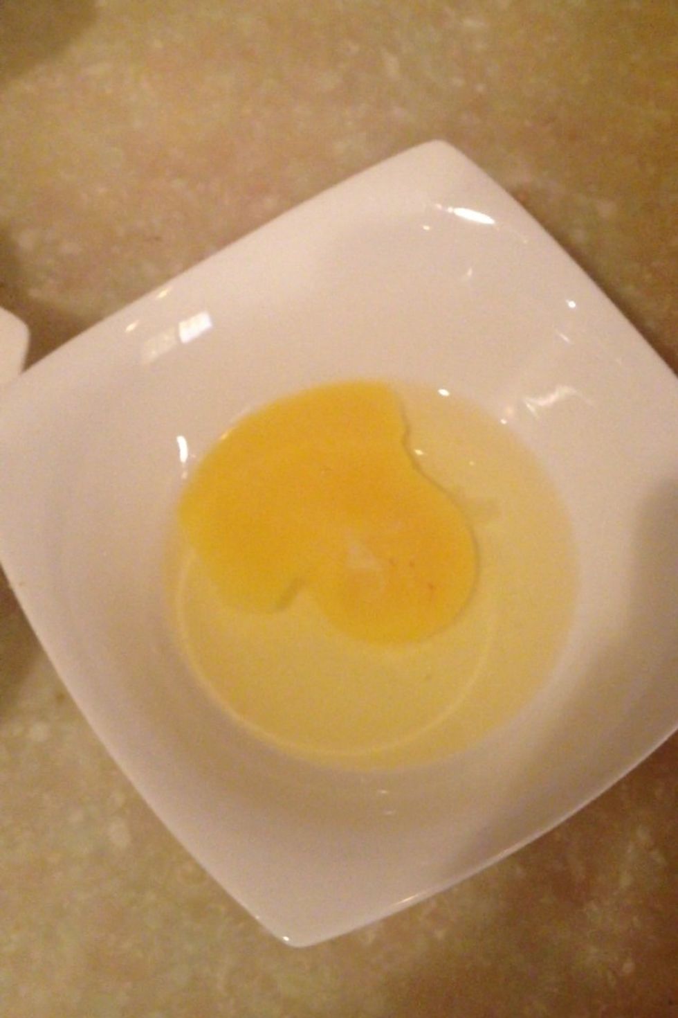 Add vanilla extract to the egg & wisk