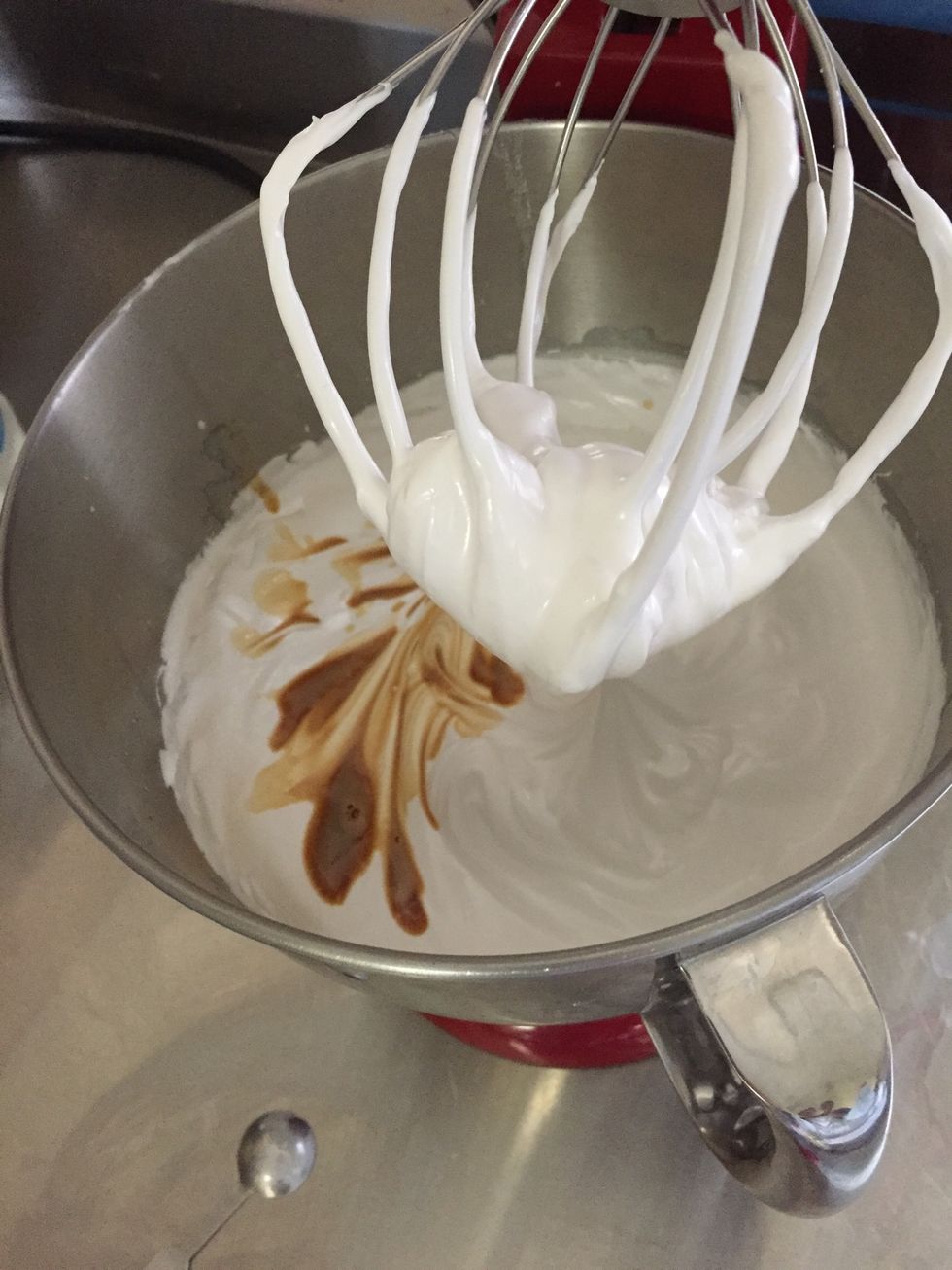 Add vanilla once its holding stiff peaks, about 5 minutes, and beat to incorporate.