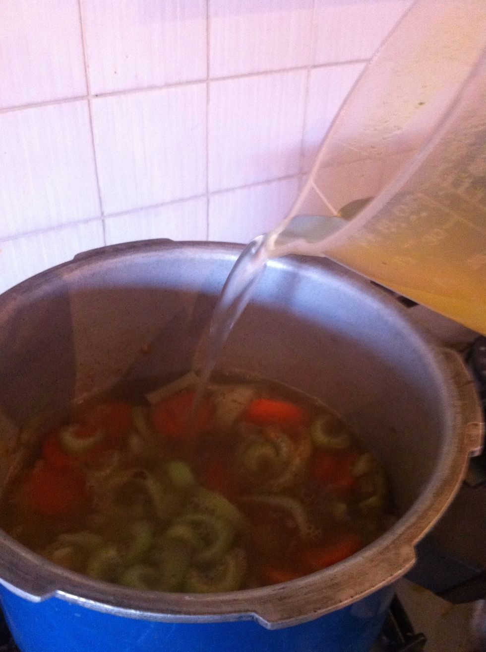 Add vegetable stock and bayleaf (optional)
