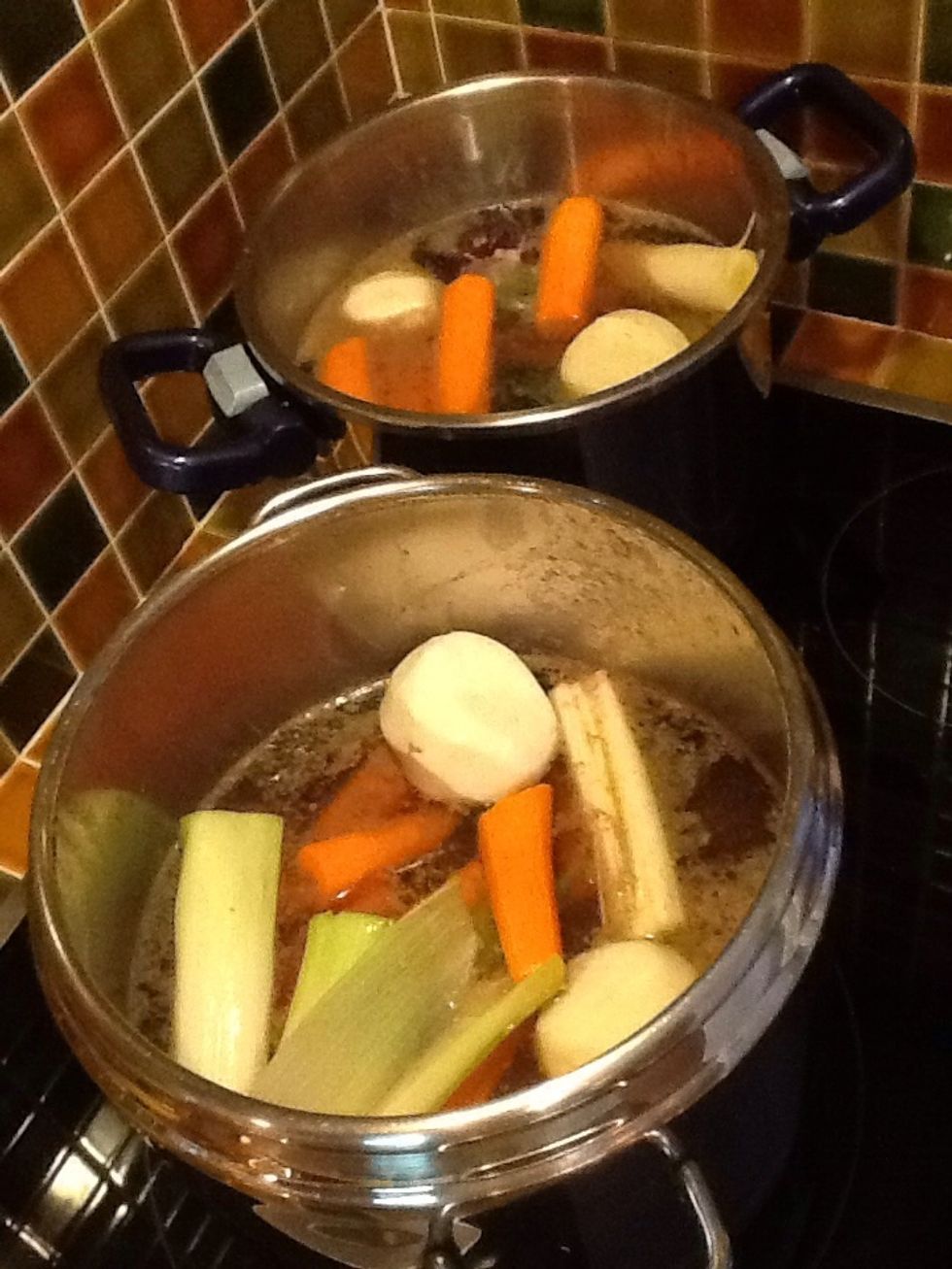Add vegetables (except potatoes and courgettes that will be added later)