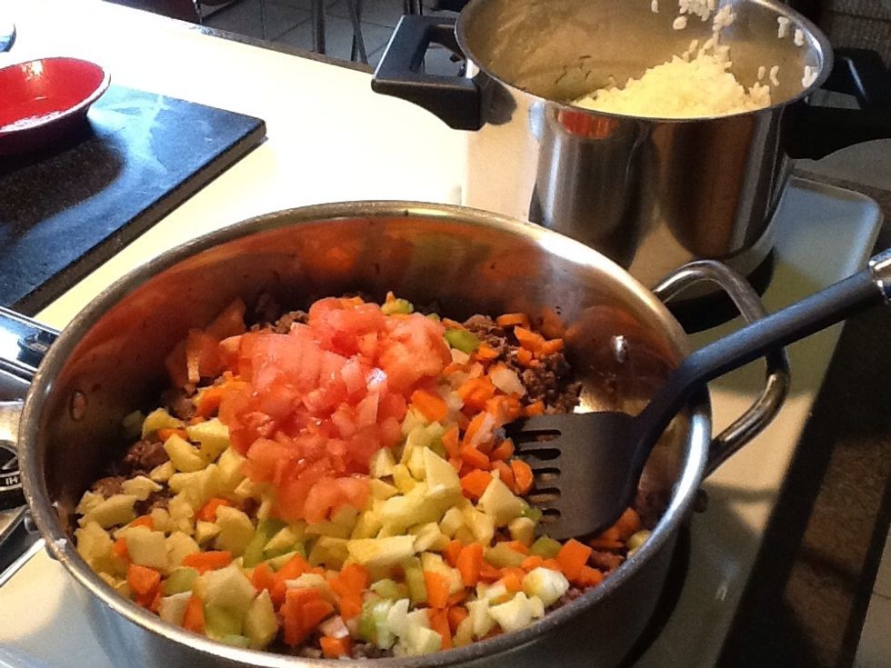 Add veggies and cook, saviing tomatos and garlic for the end so they don't get overcooked. Add fennel.