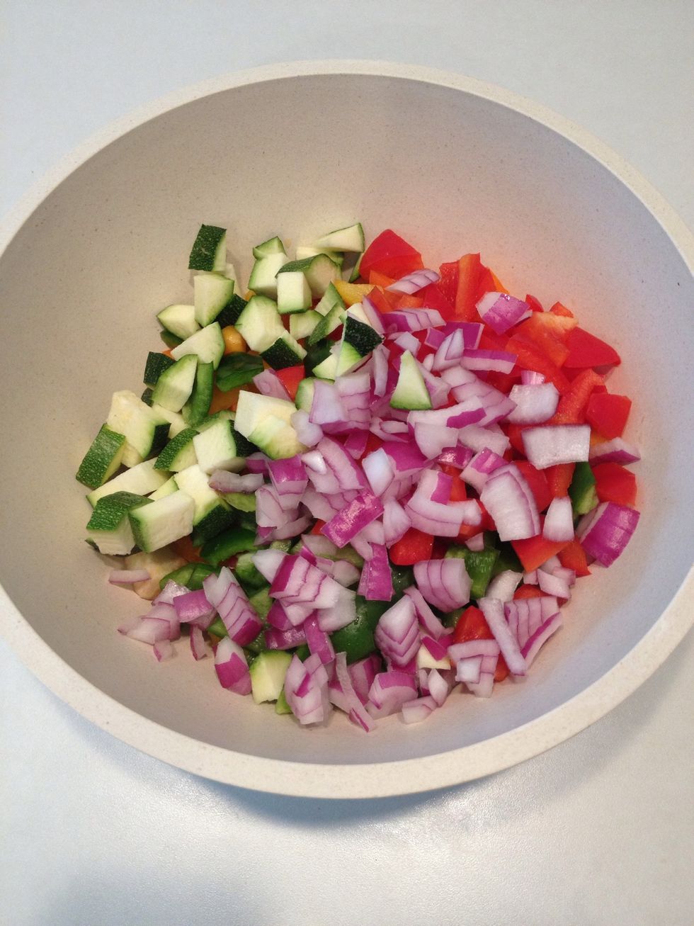 Add veggies to a large serving bowl.