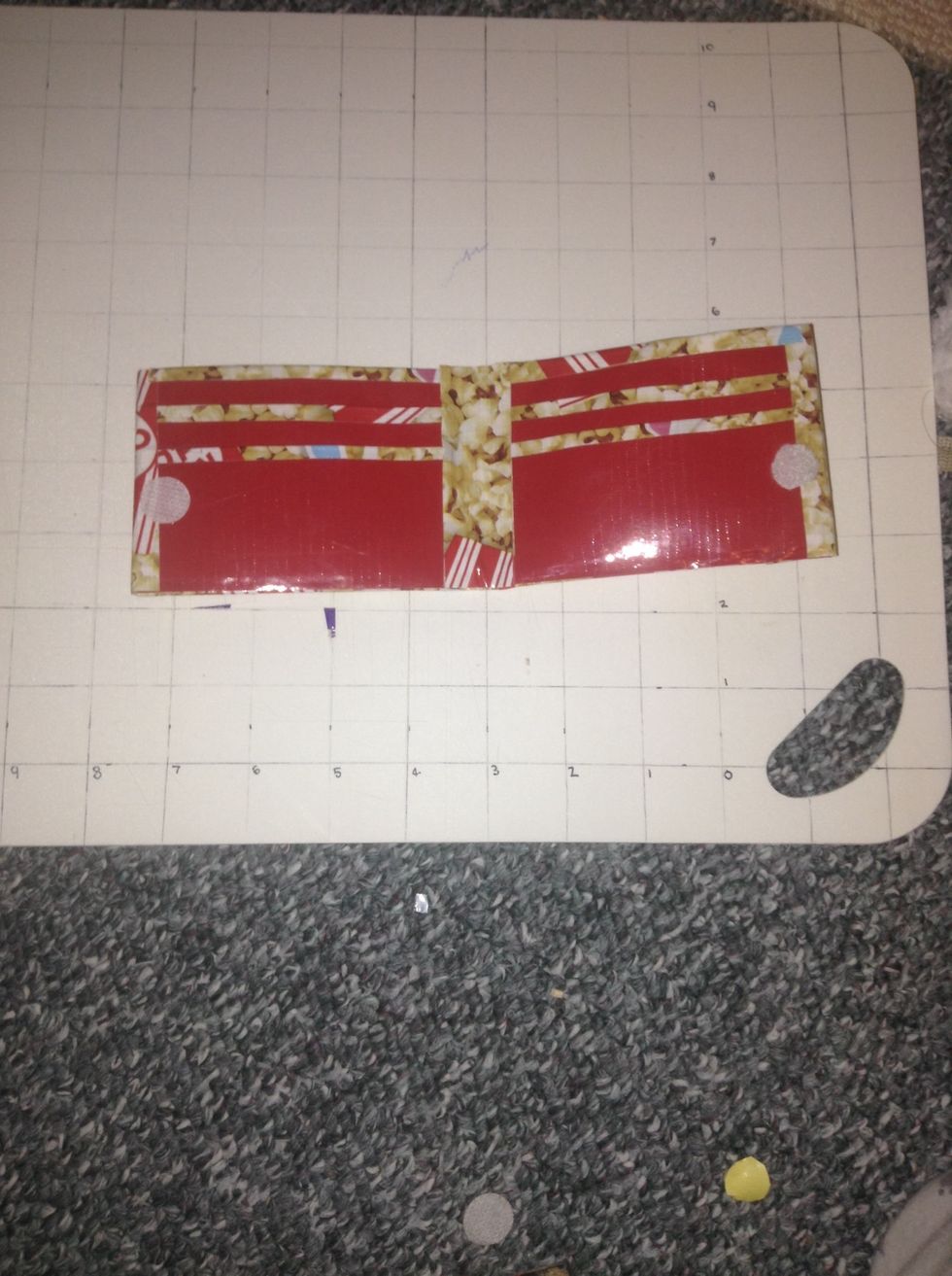 Add Velcro to the wallet on both sides so it stays closed.