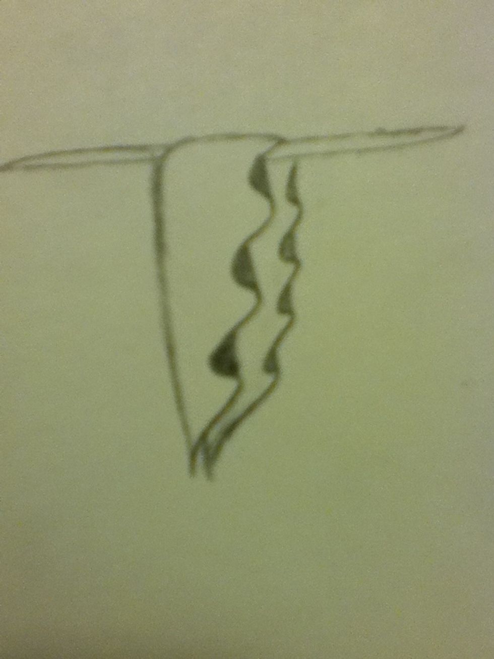 Add vertical lines as shown above and shade them. You will want to shade the front cloth darker than the back. I know that doesnt make any sense but in the next few steps it will!