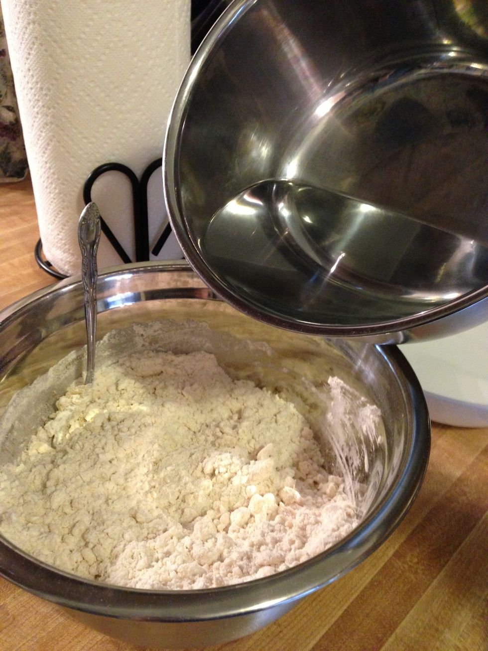 Add very hot (boiled) water. Stir until it just comes together - don't overmix!