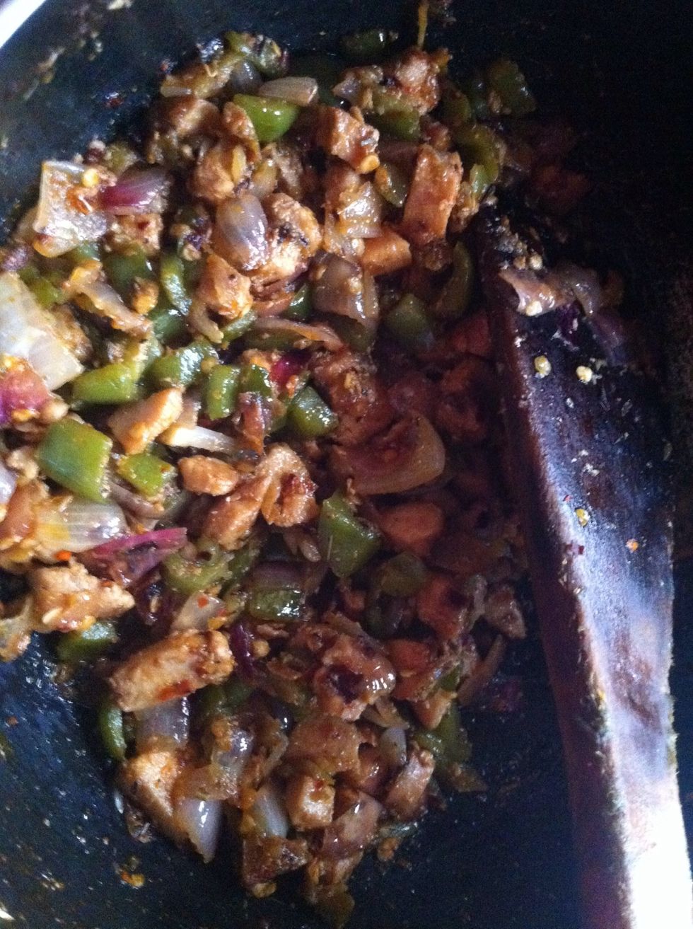 add vinegar soya sauce and ketchup and stir