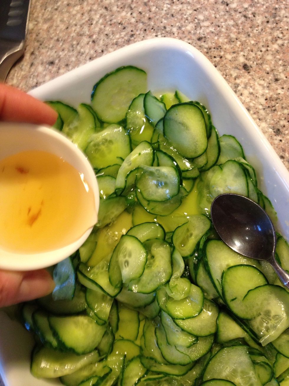 Add vinegar , taste the cucumber mix no 2 cucumbers are of the same size.