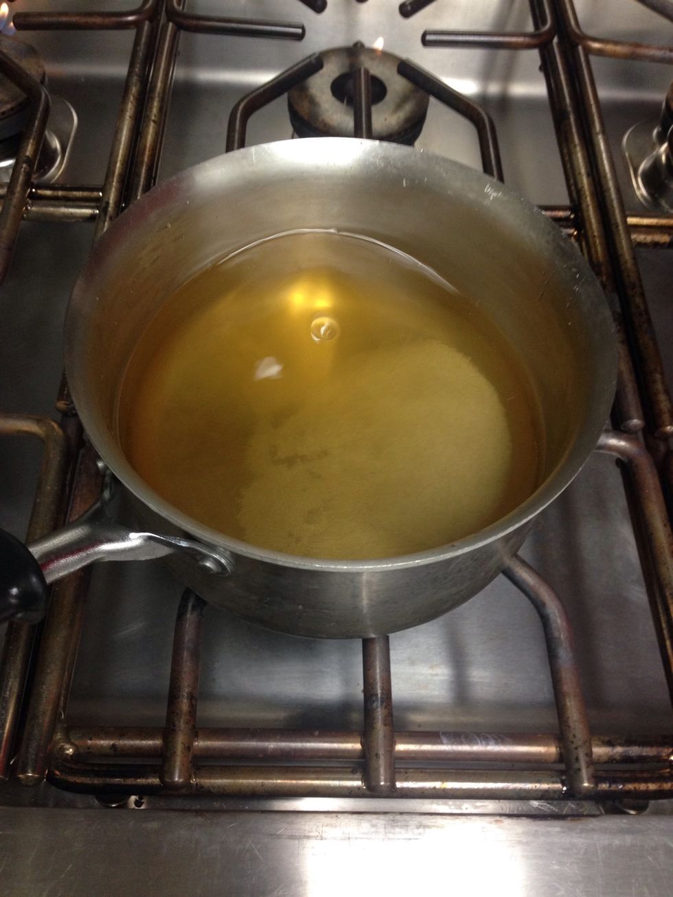 Add vinegar, water, salt and sugar in a pot over medium high flame.