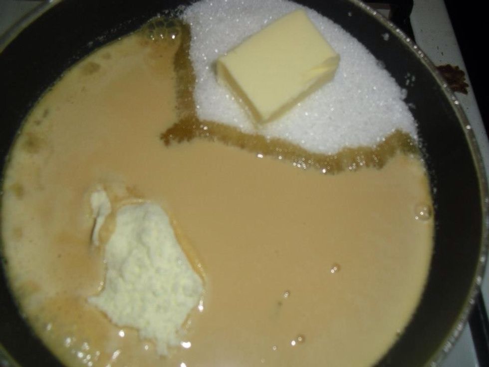 Add warm water, butter and mix well.