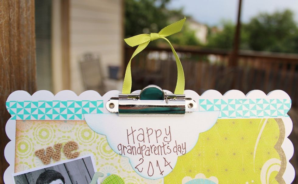 add washi tape along top of clipboard on either side of clip.
