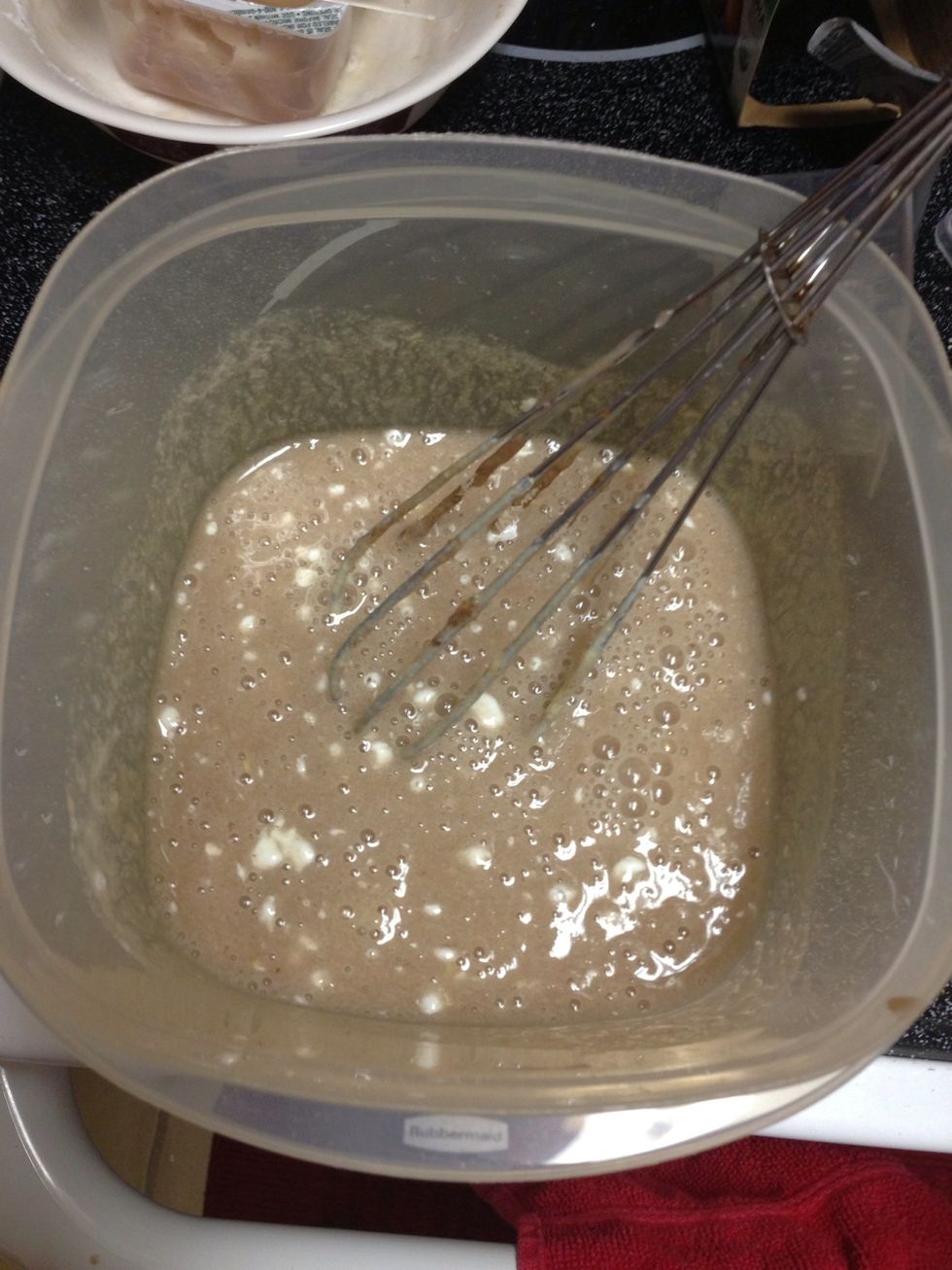 Add water and baby food and whisk well