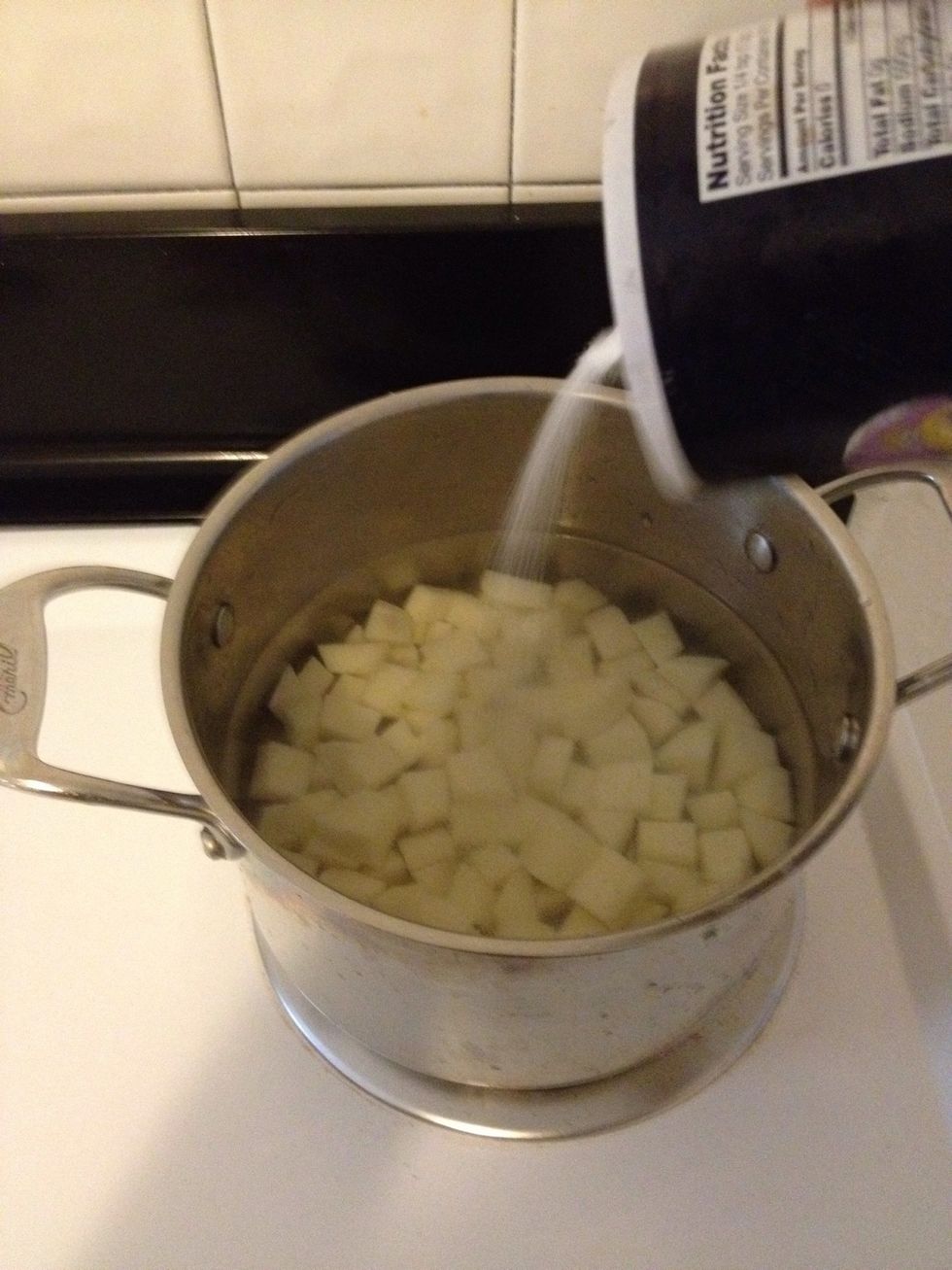Add water and salt to the potatoes and let them cook for 15-20 min or until they are fork tender