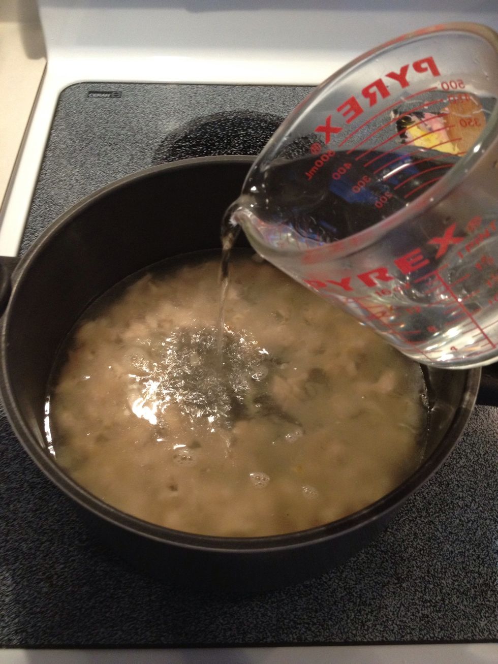 Add water and turn heat to medium high.