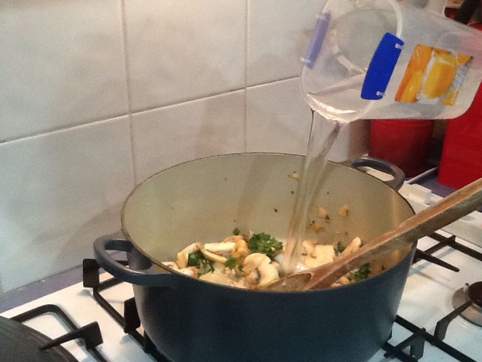 Add water and vegetable stock.