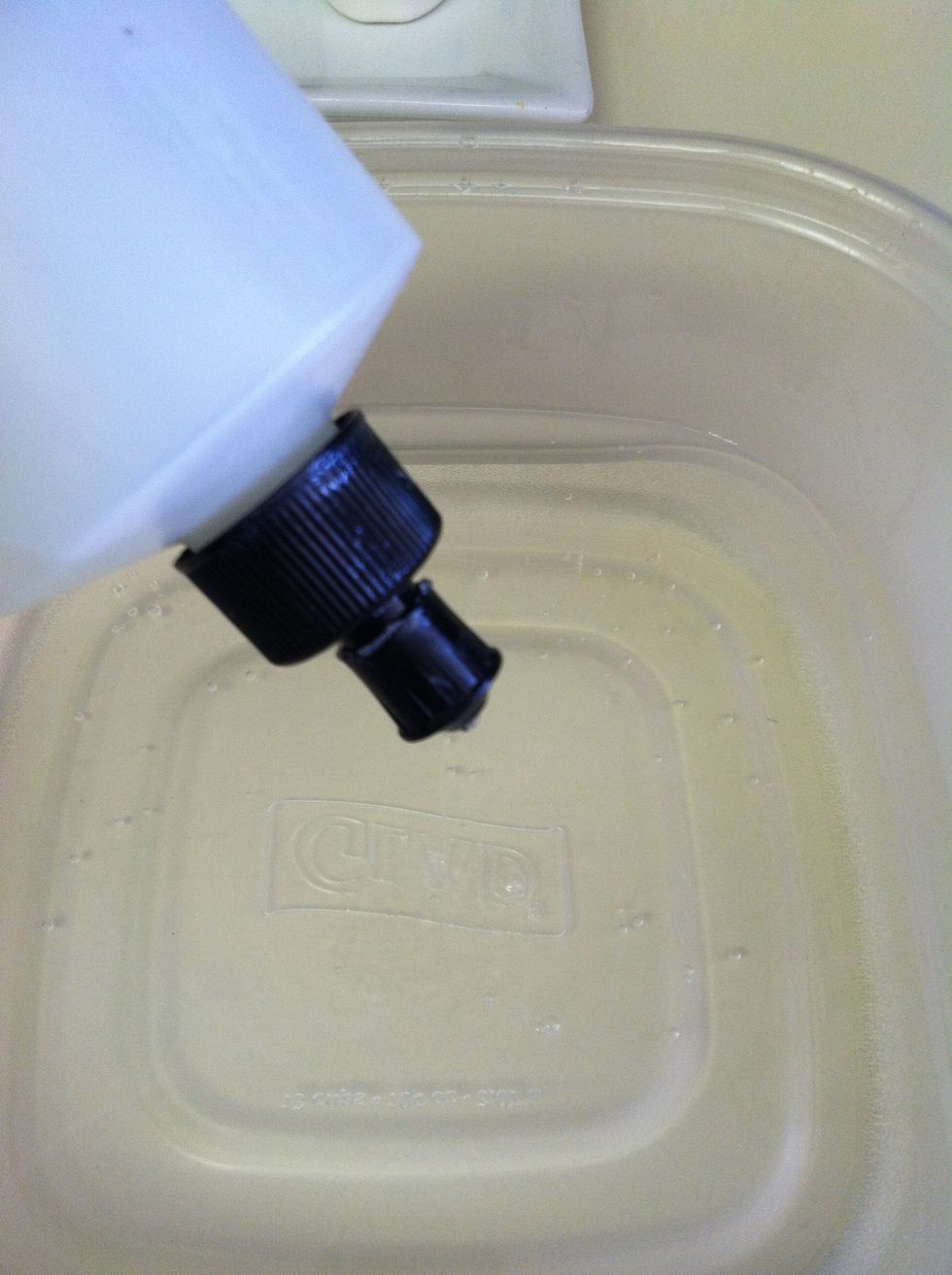 Add water in the plastic container. Make it as hot as your hands can stand and add a few drops of dish soap.