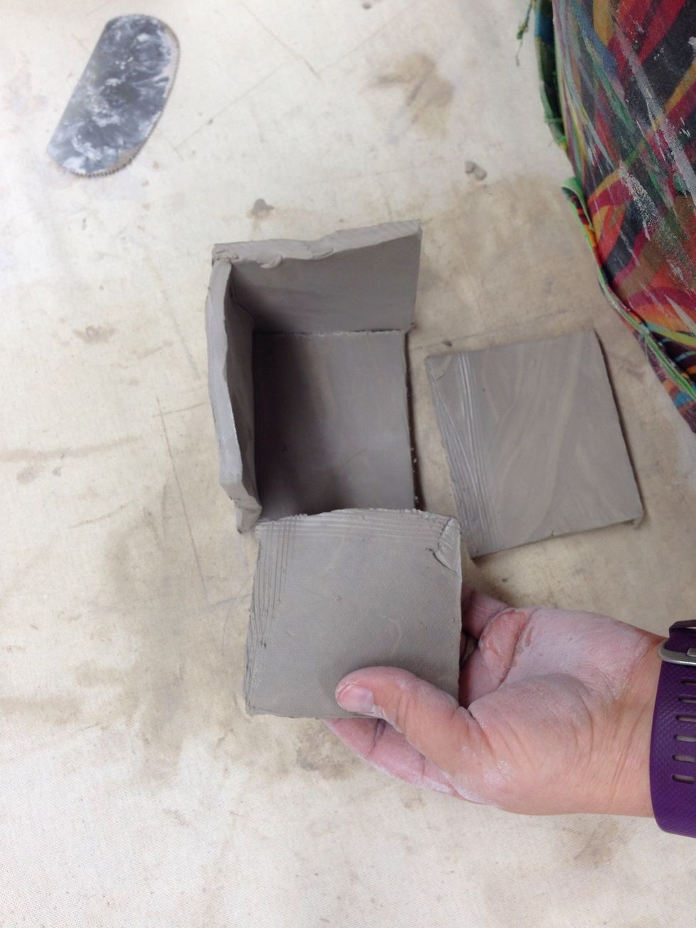 Add water or slip and fit the sides together.