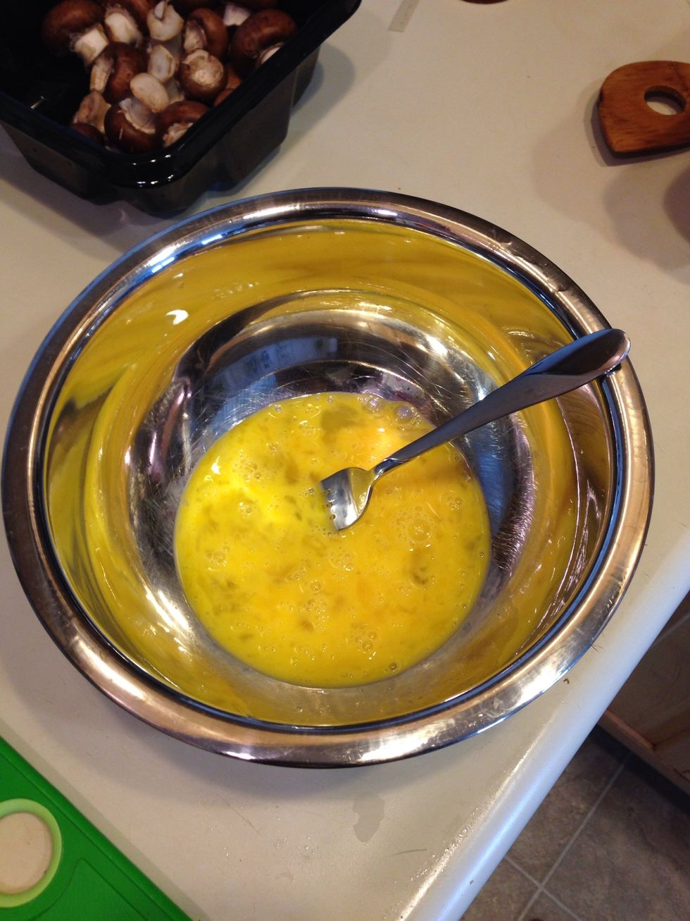 Add water, salt and pepper to the eggs. The water helps make the eggs fluffy.