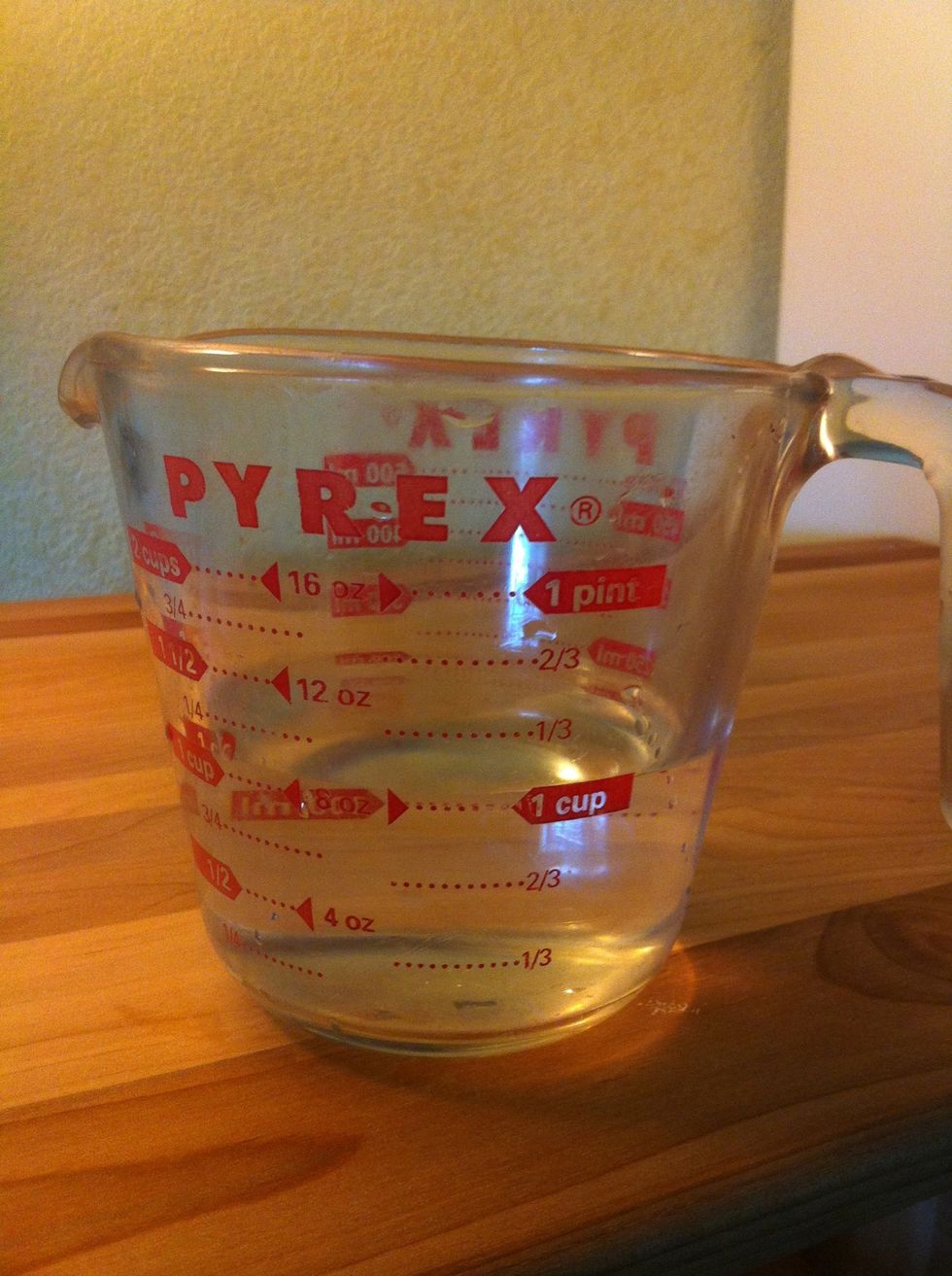 Add water slowly, mixing until you get the consistency of heavy cream.