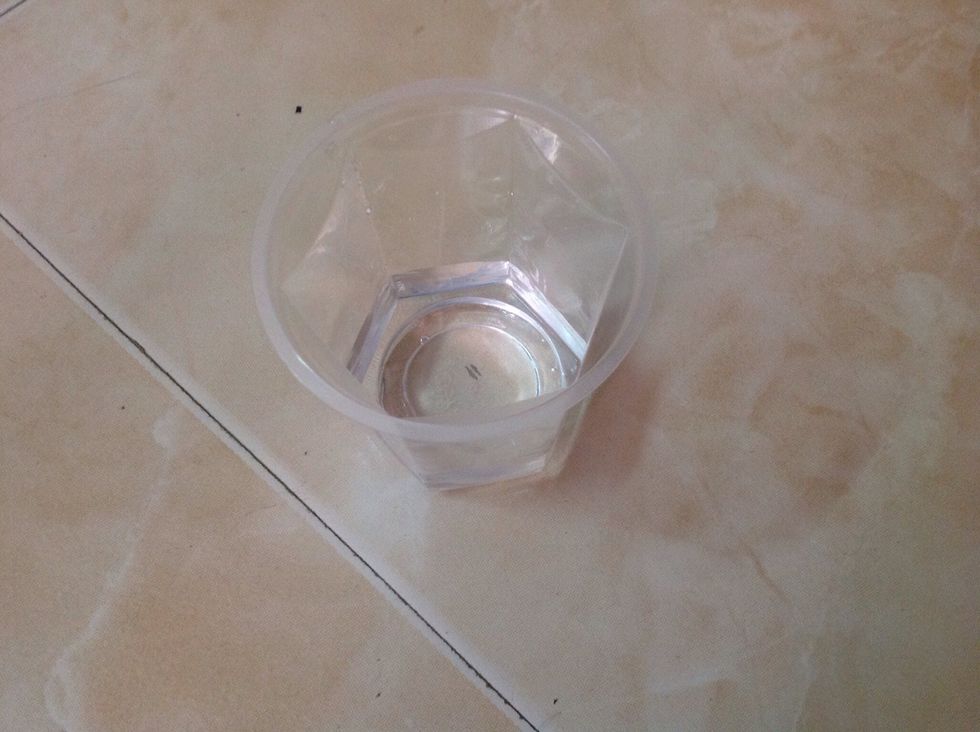 Add water to a glass