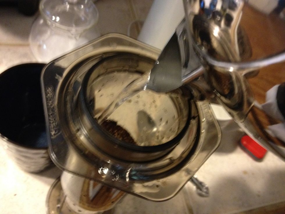 Add water to coffee and Inbru.