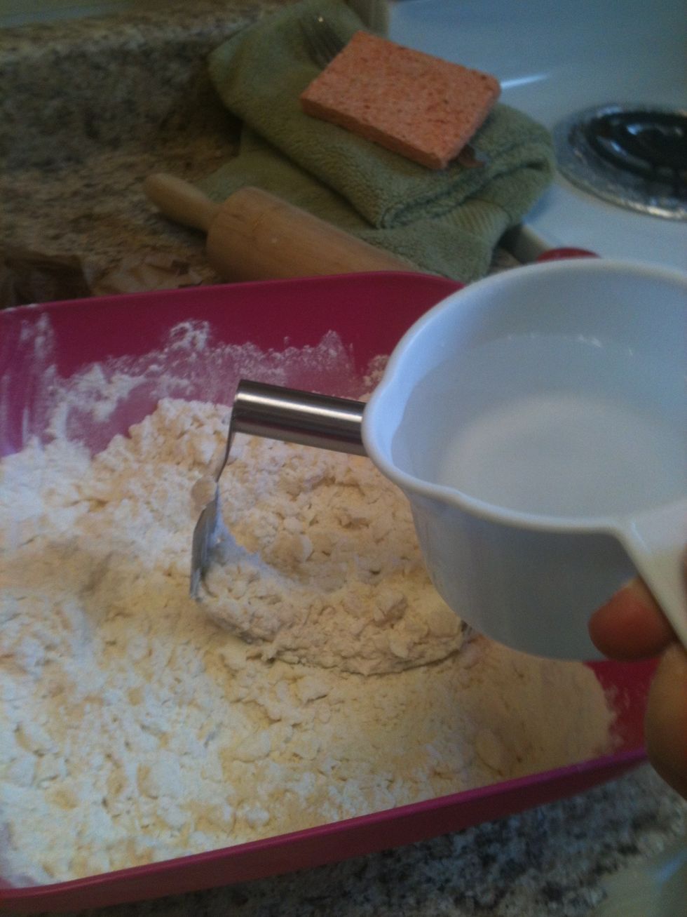Add water to make the dough stick together. But be careful! Too much water will make the crust too sticky! Ew...