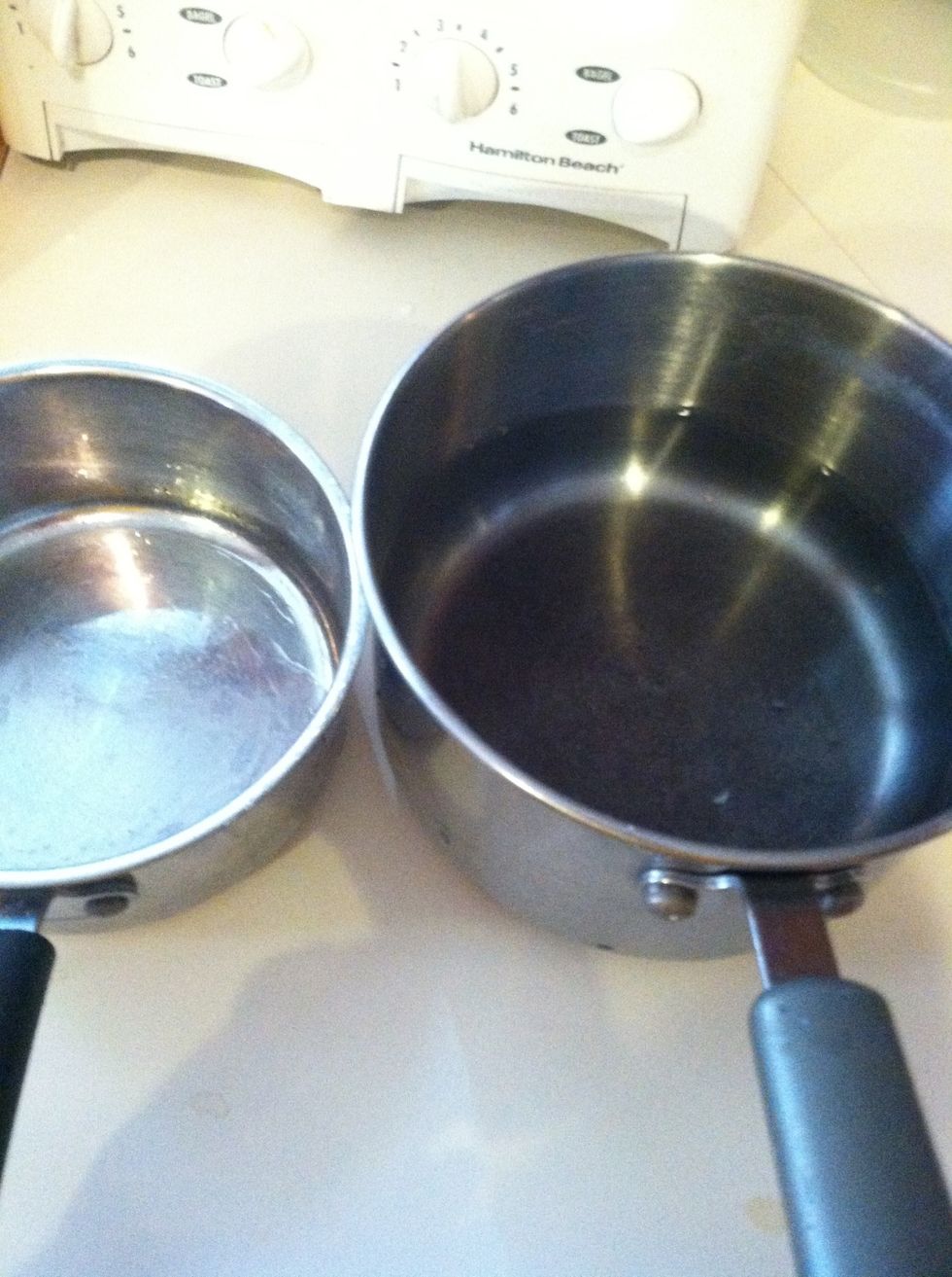 Add water to the bigger pot so that the smaller one will fit inside...this is we're u put the chocolate If you only use one pot the chocolate might stick to and burn on the edges of the pot