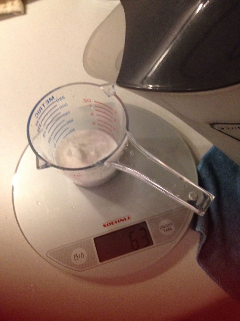 Add water to the sugar, stir and pour over strawberries